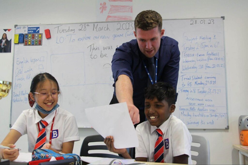 BXCL Penang International School students with their teacher in class